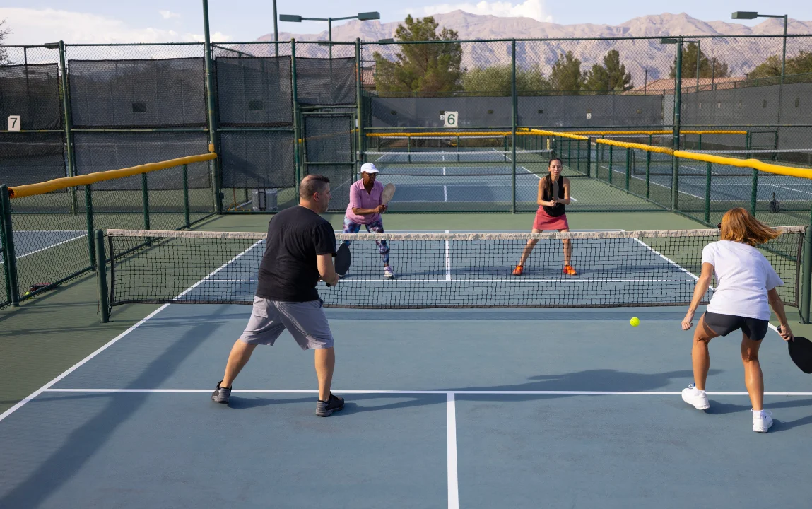 Kitchen rules in pickleball court showing Non-Volley Zone boundaries and player positioning
