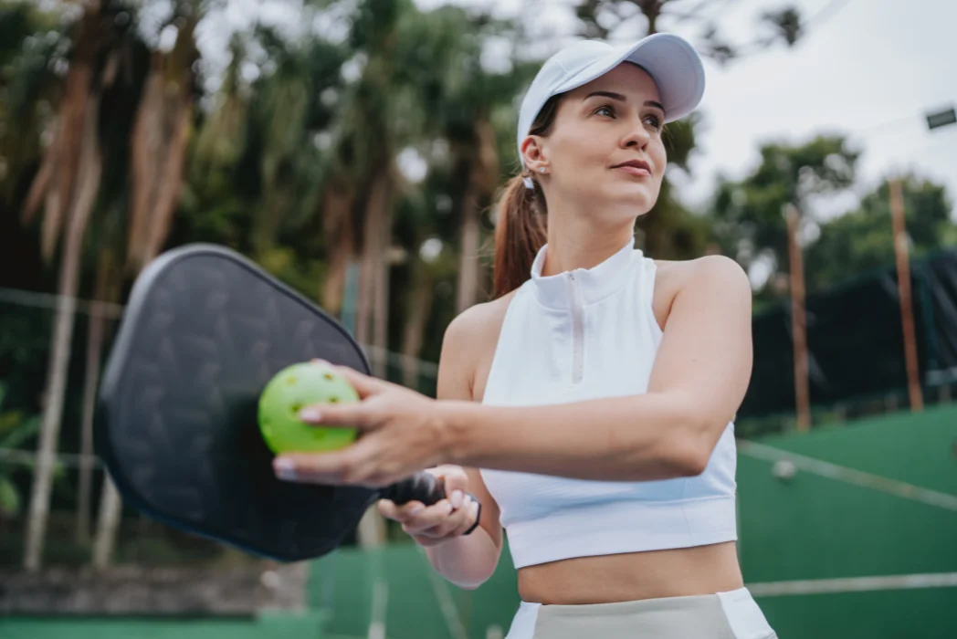 Player demonstrating legal pickleball serve rules 2025 on court